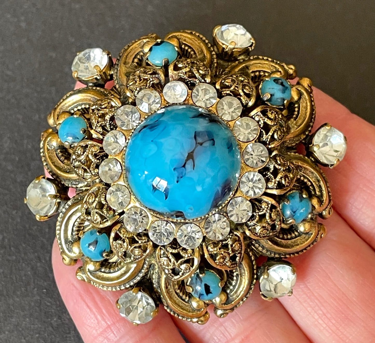 Large vintage Art Deco faux turquoise glass cabochon, clear paste rhinestone and gold tone filigree Czech flower brooch
