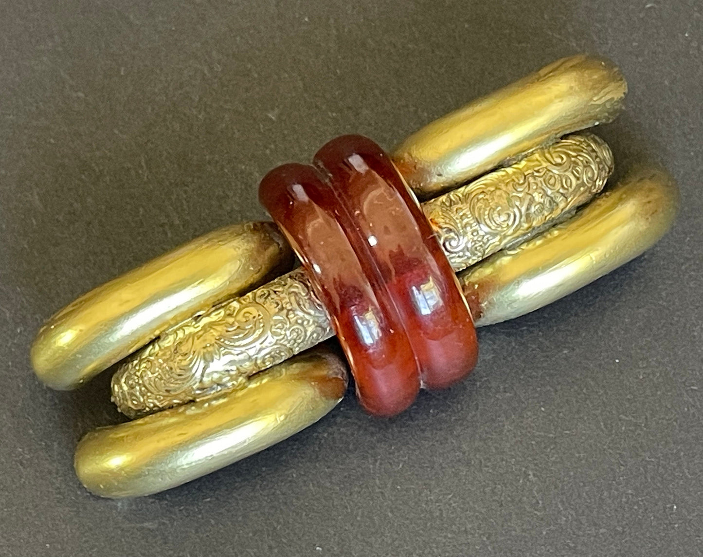 Large vintage rootbeer Bakelite (verified) and gold tone pinchbeck ? Art Deco machine age geometric brooch, classic 1930s design