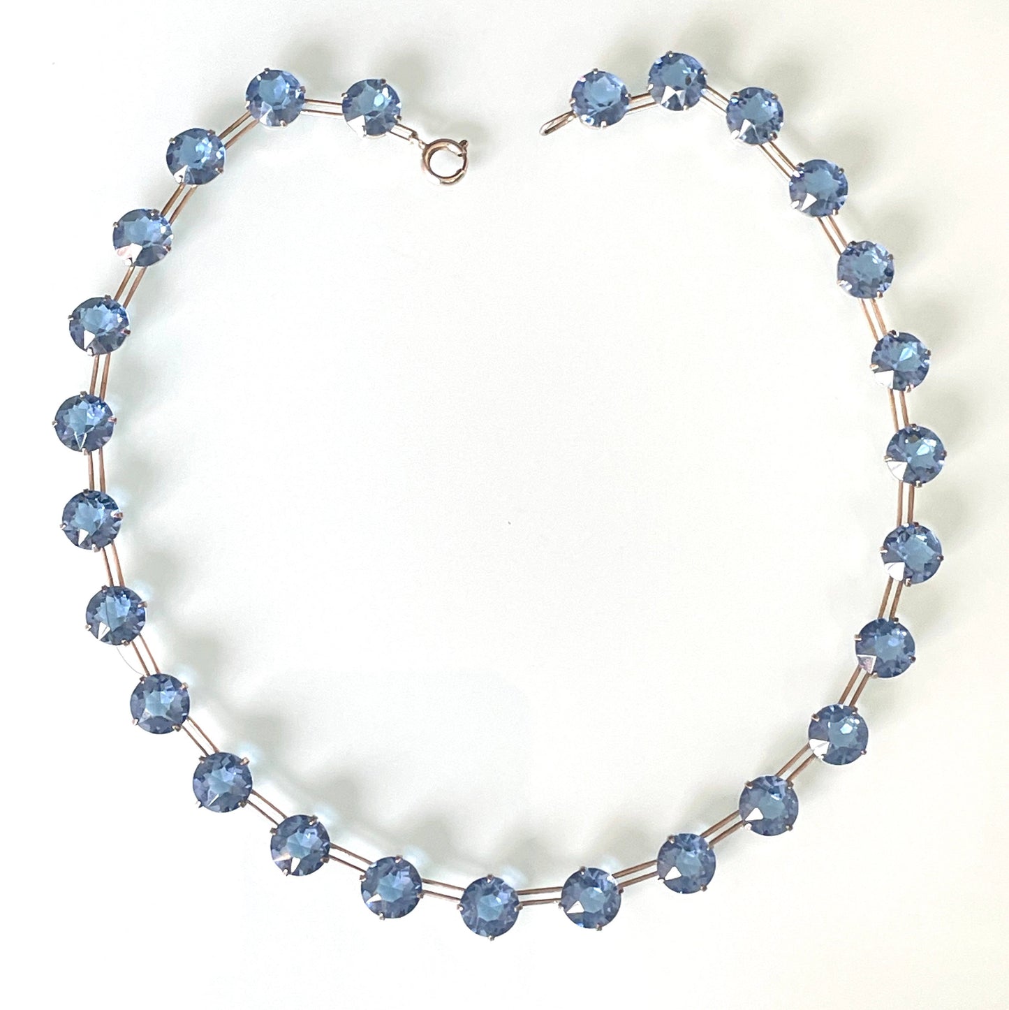Vintage sterling silver Art Deco sapphire blue chaton cut crystal rhinestone riviere necklace bezel set, open backed, by W H Collins