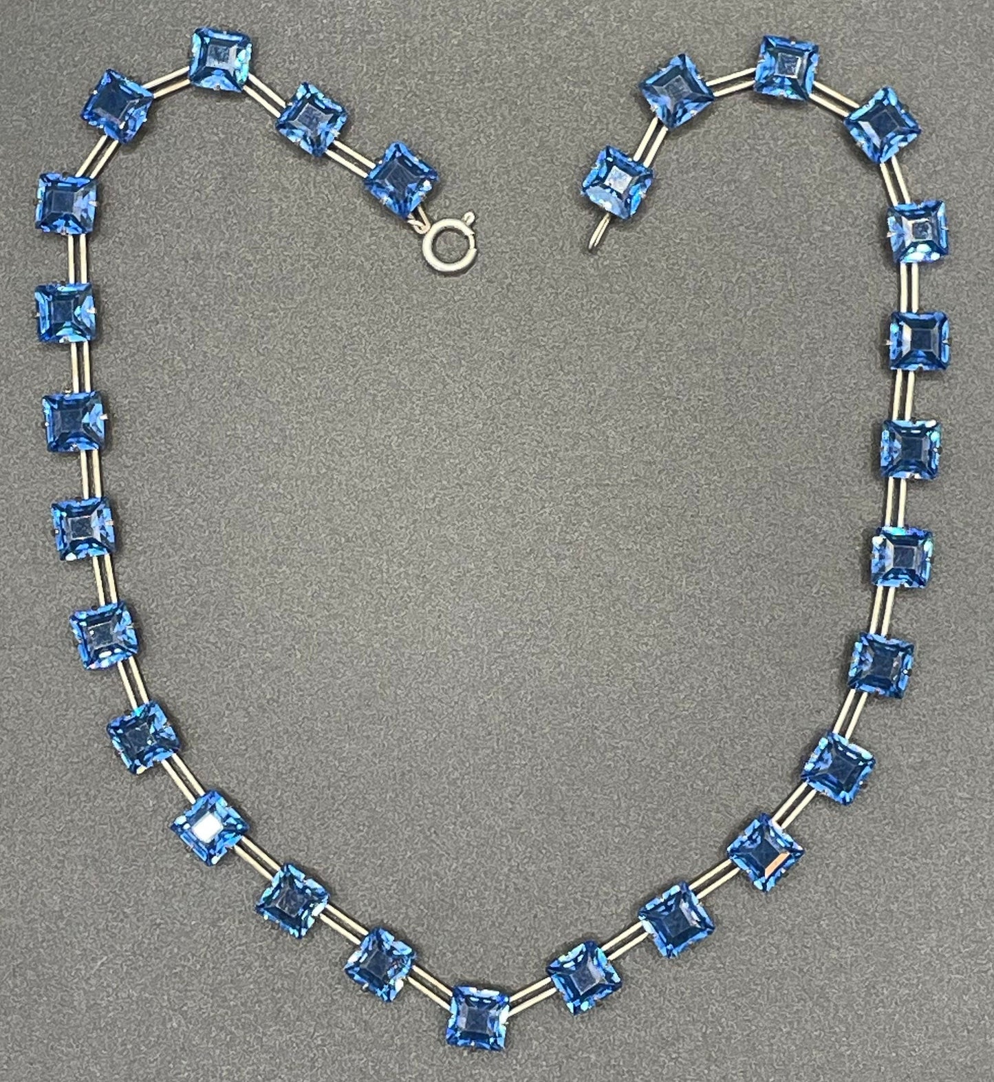 Vintage Sterling silver Art Deco bezel set sapphire blue crystal riviere necklace, open-backed princess cut (square) rhinestones, hallmarked