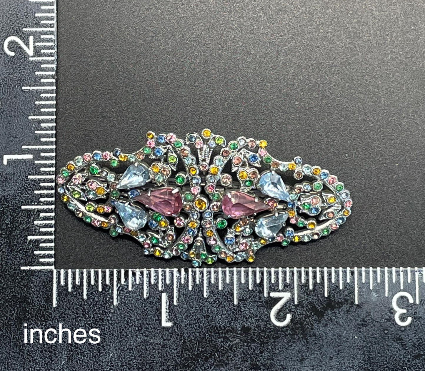 Vintage Art Deco Czech duette with multi-coloured rhinestones - a silver tone filigree brooch that can be converted to two dress clips