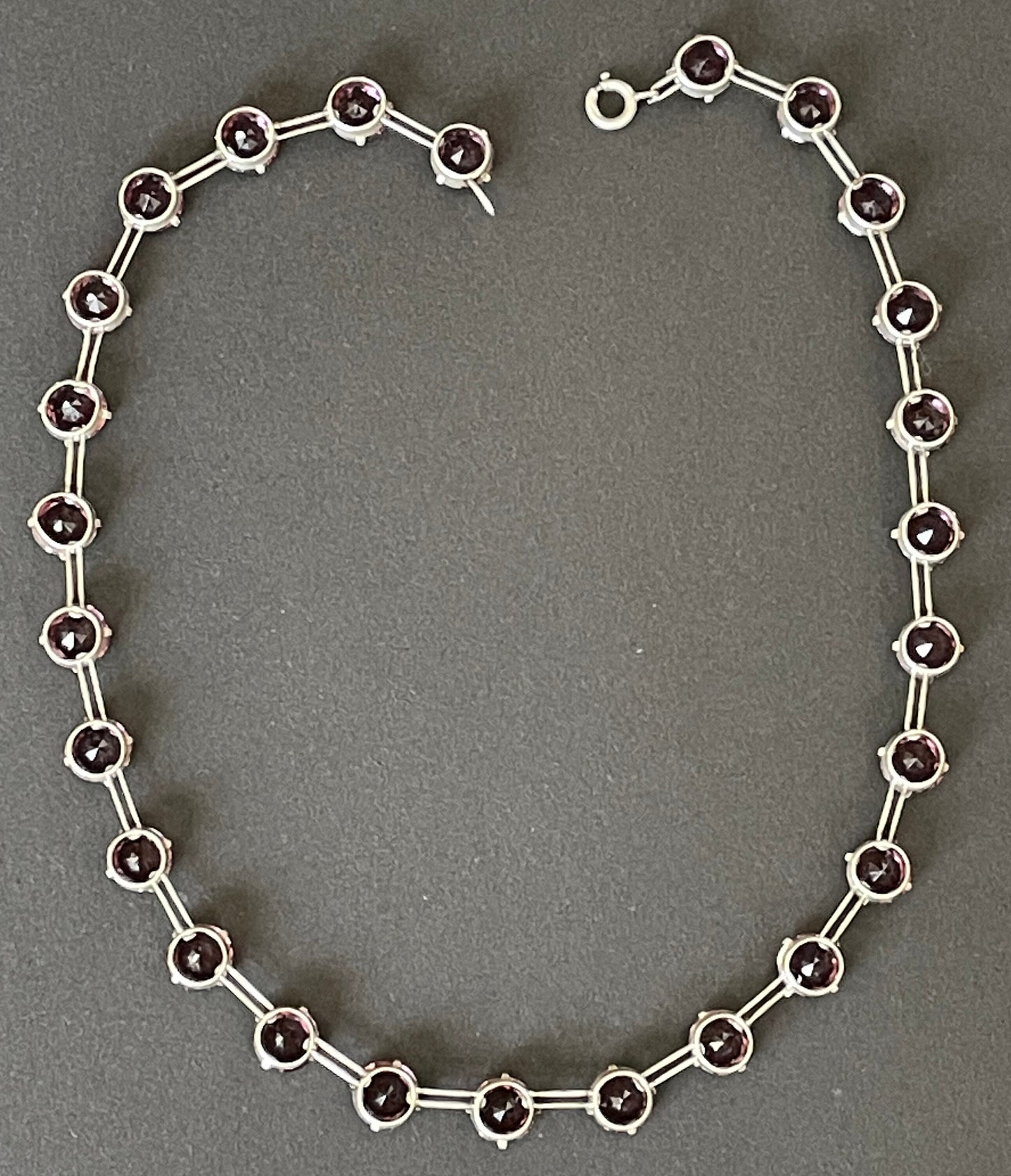 Vintage sterling silver Art Deco ruby pink / amethyst purple chaton cut crystal rhinestone riviere necklace bezel set, open backed