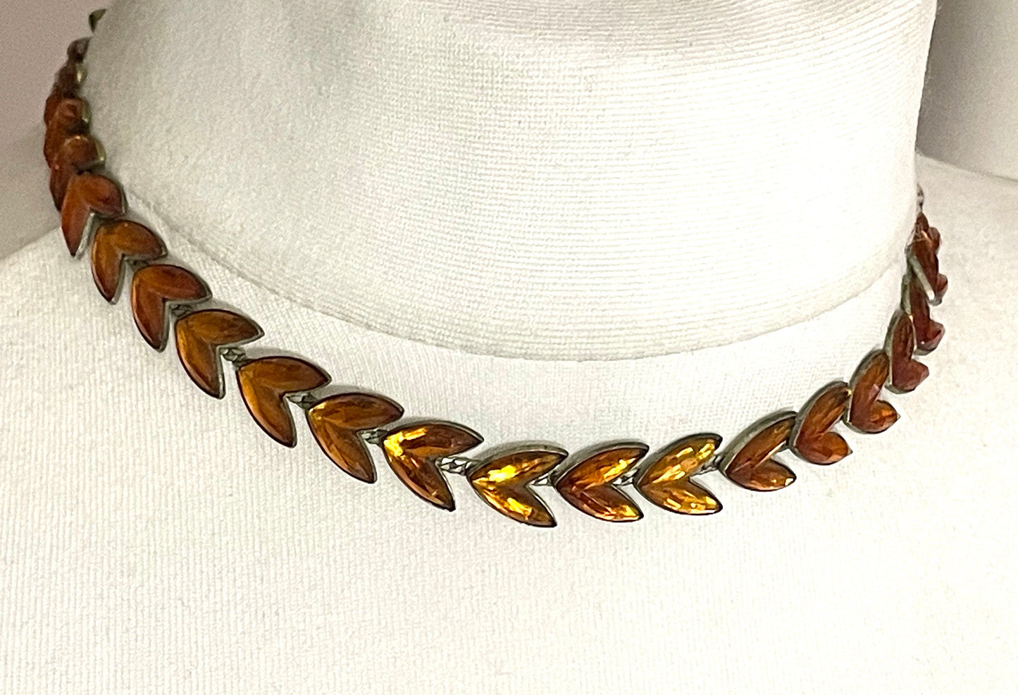 Vintage citrine yellow / topaz orange moulded Vauxhall style glass leaf design necklace, set in antique brassy gold tone