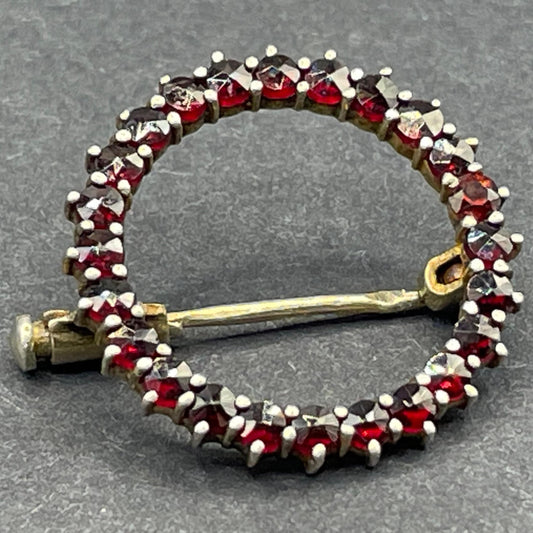 Petite vintage / antique Bohemian garnet circle brooch, rose cut stones set in hallmarked sterling silver gilt, trombone clasp