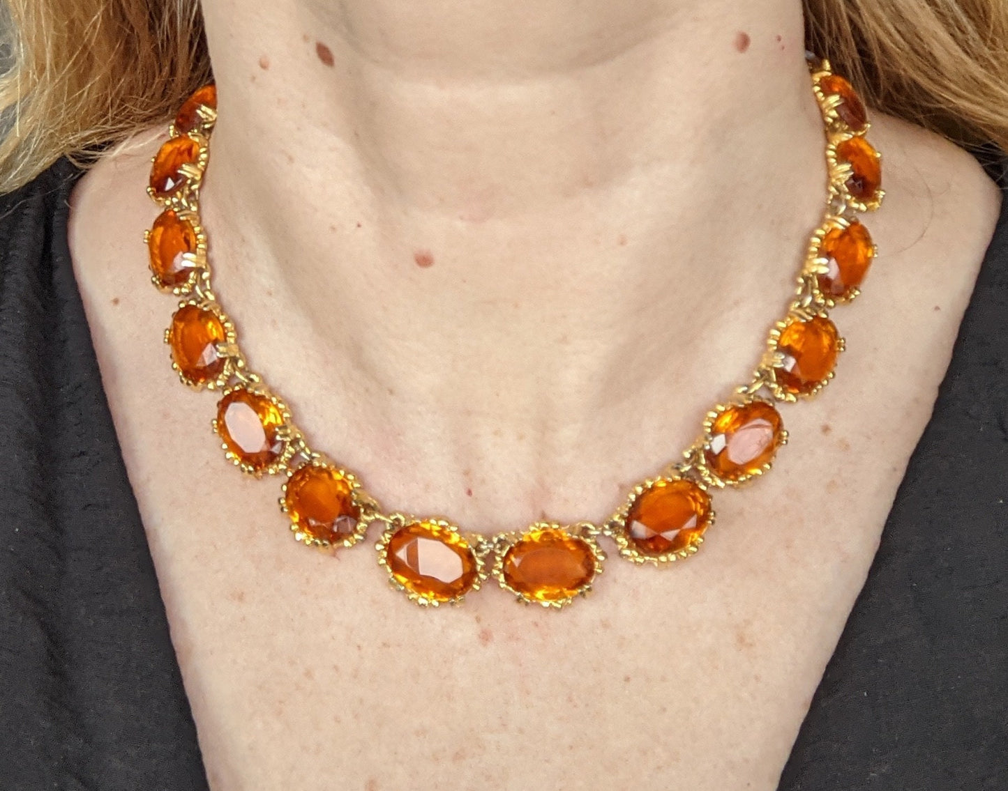 Vintage bright orange topaz / citrine yellow riviere necklace, made by Sphinx, bezel set, open-backed stones in ornate gold tone setting