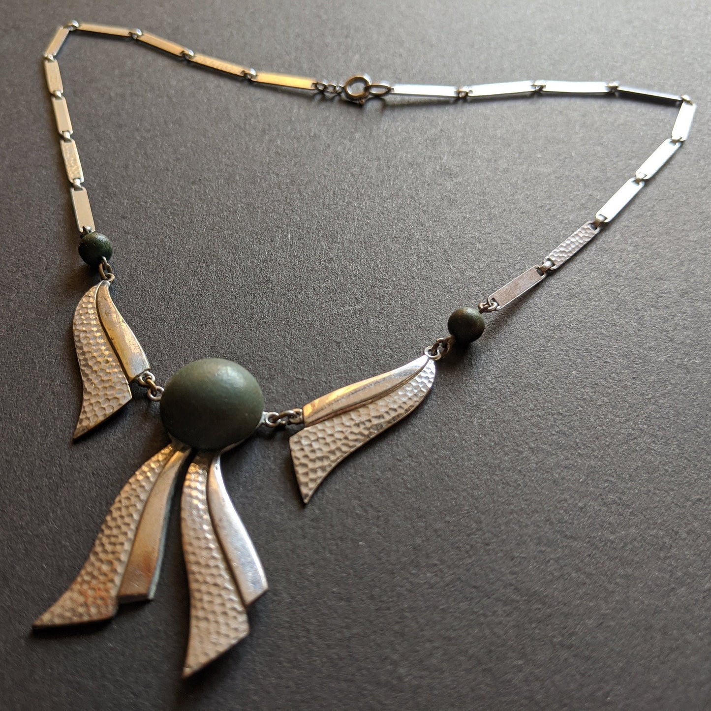 Vintage Jakob Bengel Art Deco machine age chrome and olive green galalith bow necklace