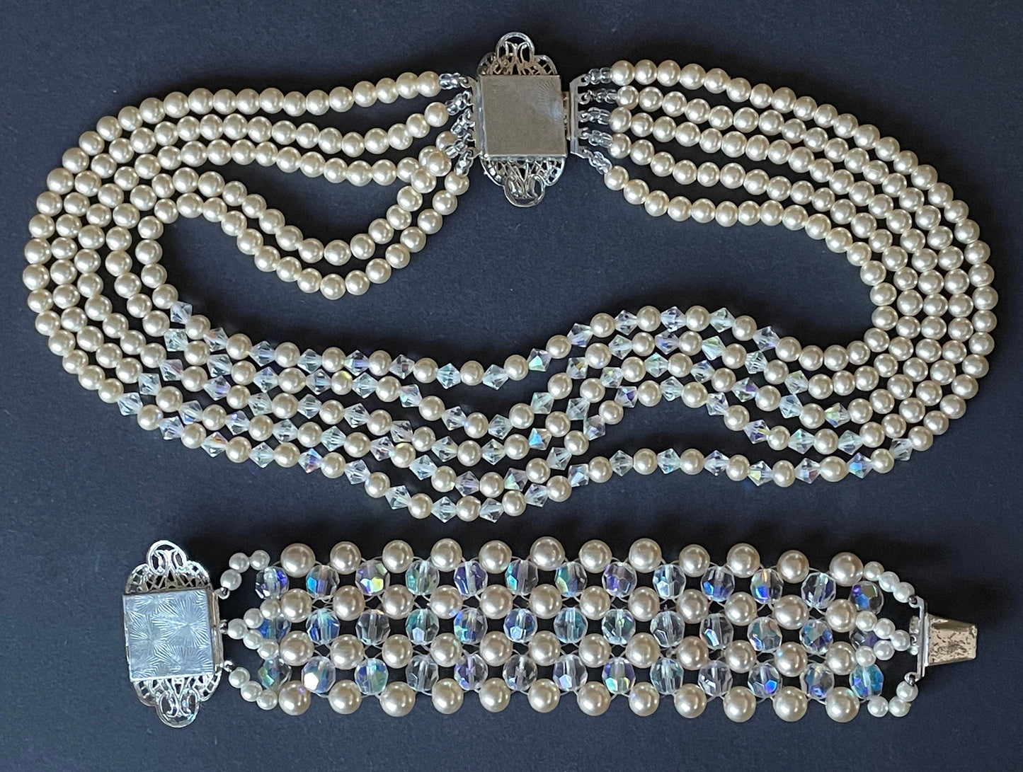 Vintage multi five strand glass faux pearl and crystal bead necklace and matching bracelet, each with large ornate rhinestone box clasp