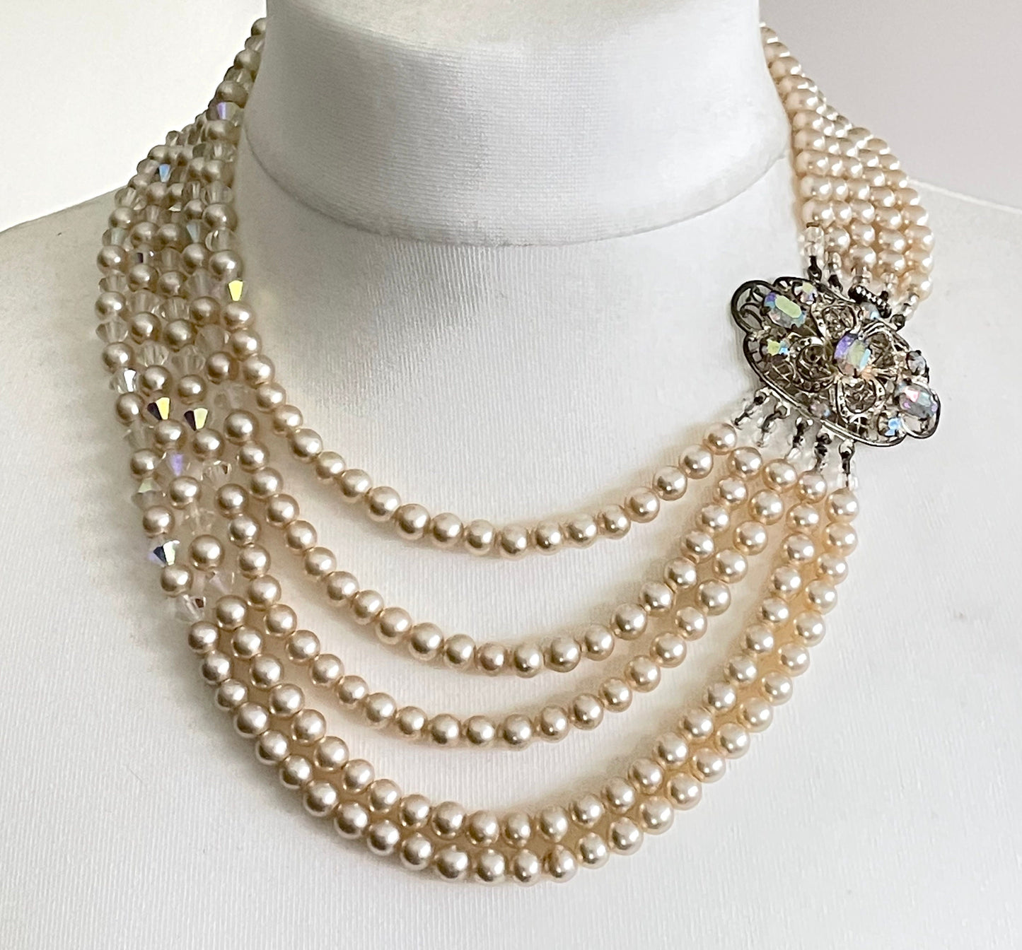 Vintage multi five strand glass faux pearl and crystal bead necklace and matching bracelet, each with large ornate rhinestone box clasp