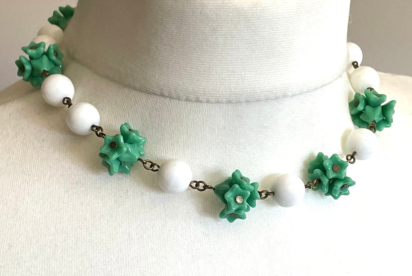 Vintage Art Deco green glass flower and large white milk glass bead, delicate glass necklace