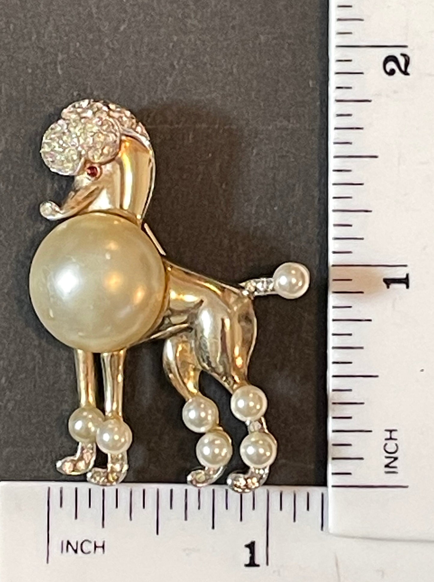 Rare signed Trifari vintage poodle brooch, 1950 patent of the Alfred Philippe design, gold tone, glass pearl and rhinestones