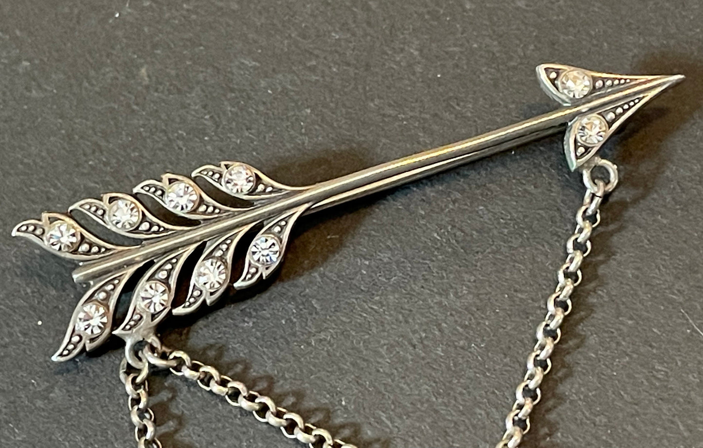 Large early Askew London, vintage cupid's arrow love brooch in antique silver tone with rhinestones, cherub, heart locket and key