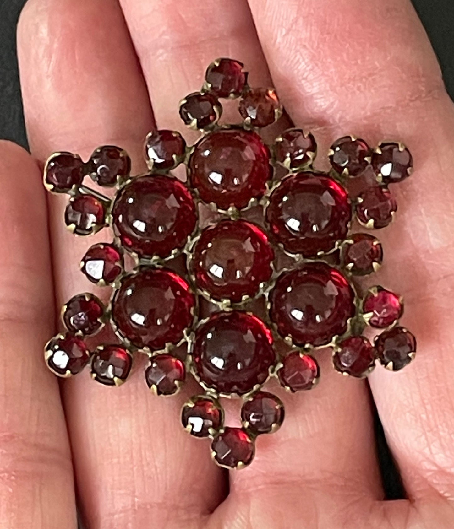 Vintage / antique Bohemian garnet star brooch, rose cut stones and cabochons set in yellow metal possibly gold, Victorian