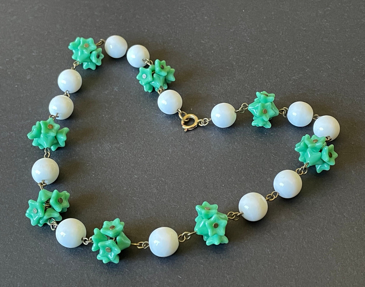 Vintage Art Deco green glass flower and large white milk glass bead, delicate glass necklace