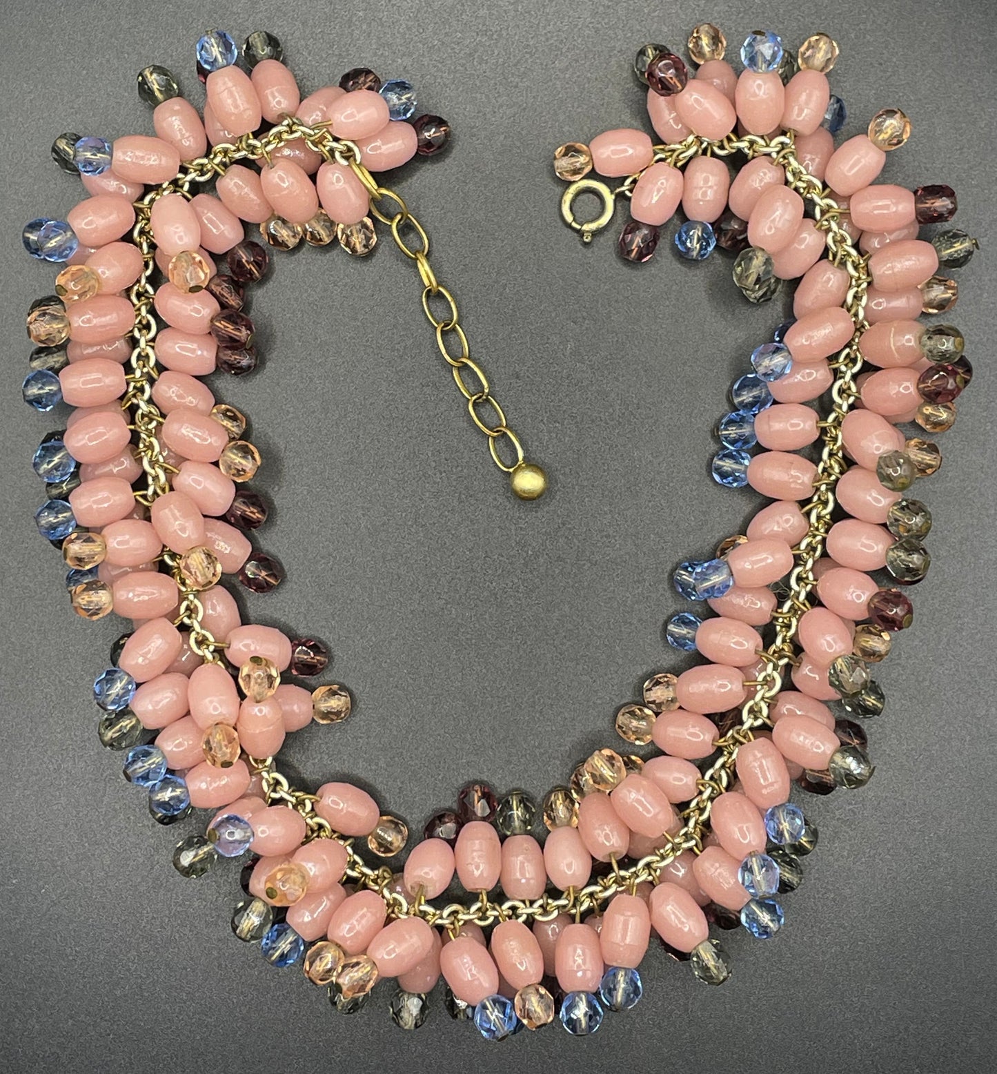 Heavy vintage baby pink, dark pink, grey and blue glass bead and Austrian faceted crystal bead fringe necklace with gold tone chain