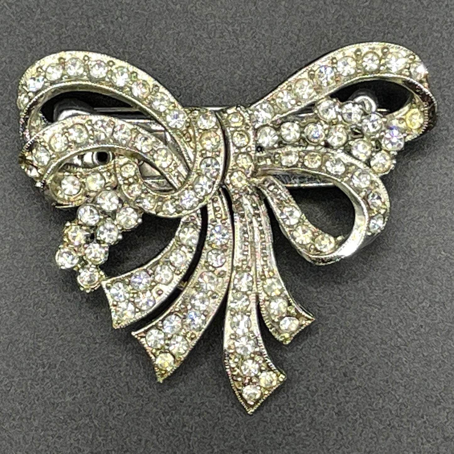 Vintage Art Deco asymmetric bow design duette - a beautiful metamorphic rhinestone brooch which can be converted to two dress clips