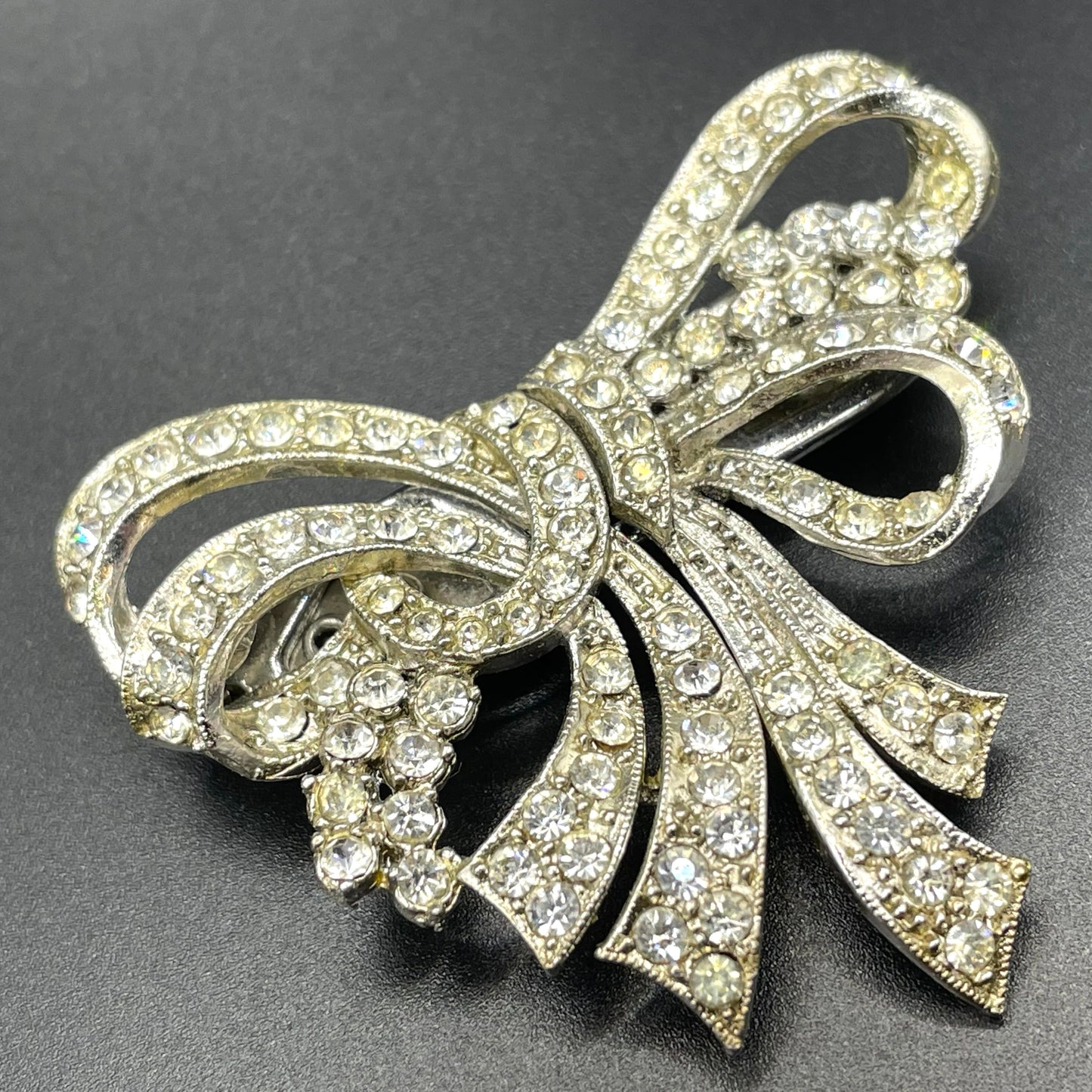 Vintage Art Deco asymmetric bow design duette - a beautiful metamorphic rhinestone brooch which can be converted to two dress clips