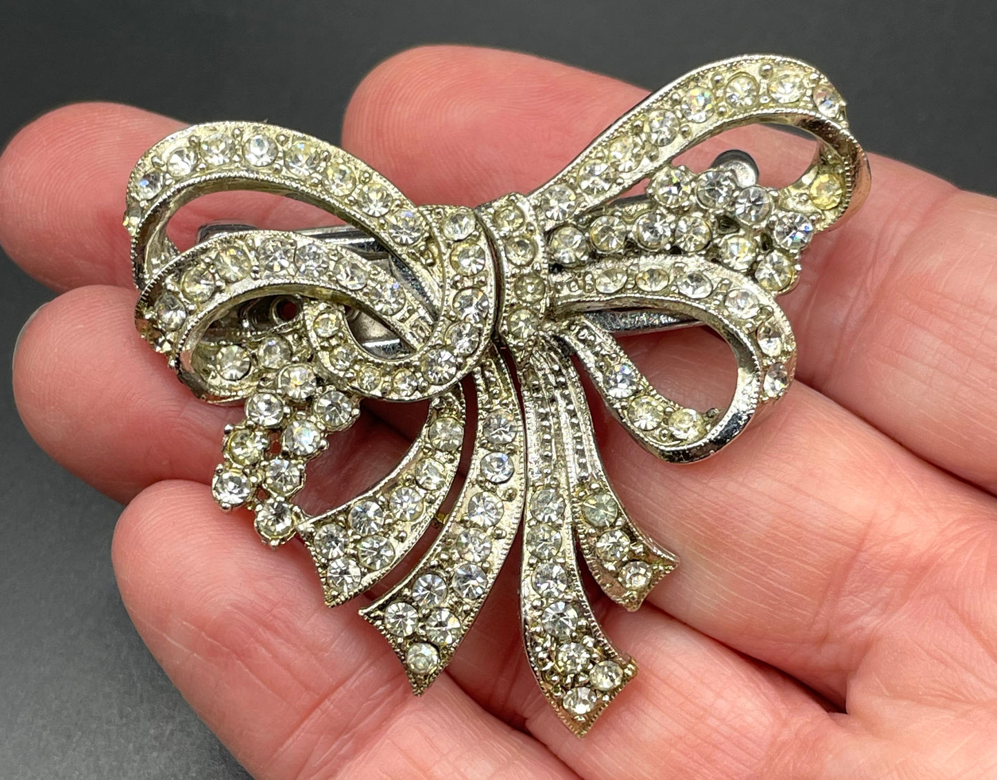 Vintage Art Deco asymmetric bow design duette - a beautiful metamorphic rhinestone brooch which can be converted to two dress clips