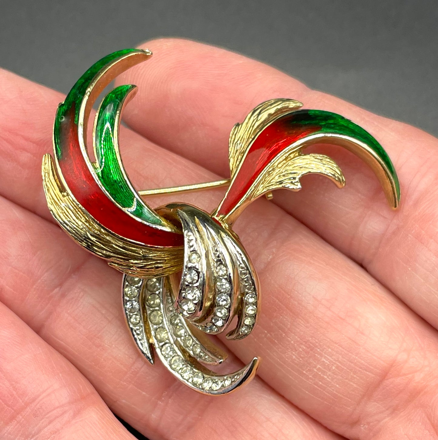 Vintage Attwood and Sawyer abstract swirl brooch, 22ct gold plated, red and green enamel and clear rhinestones, signed A&S