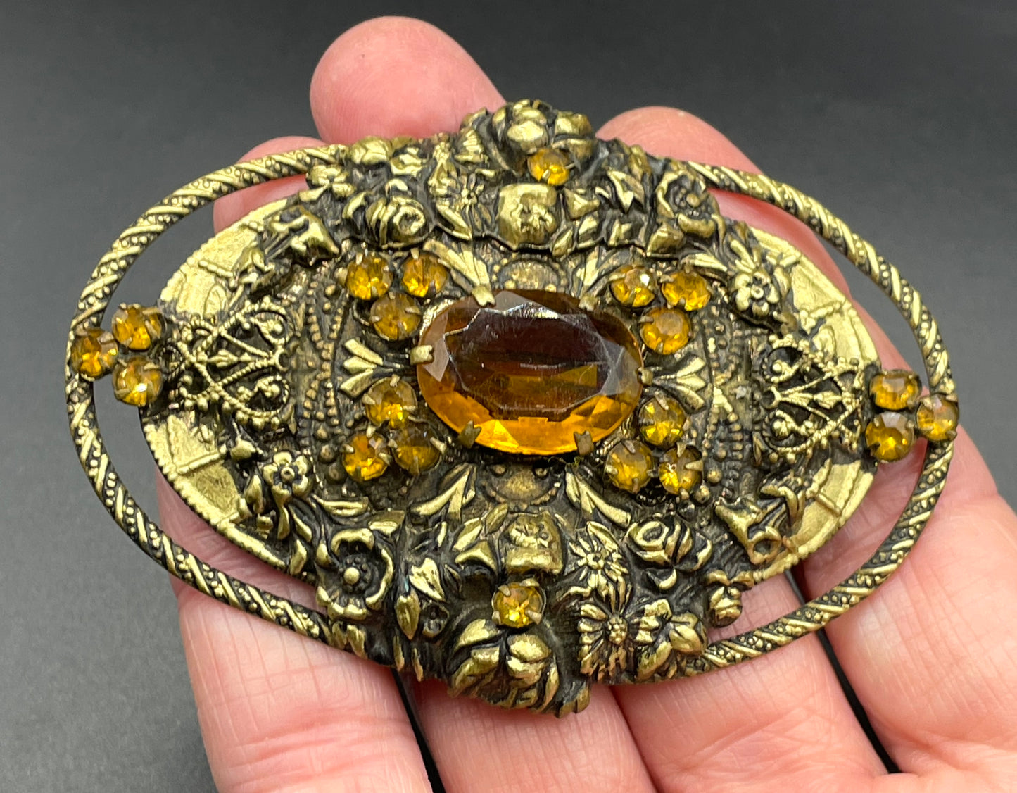 Huge vintage Neiger style Art Deco topaz orange glass rhinestone Czech brooch in antique gold tone filigree, floral repousse work