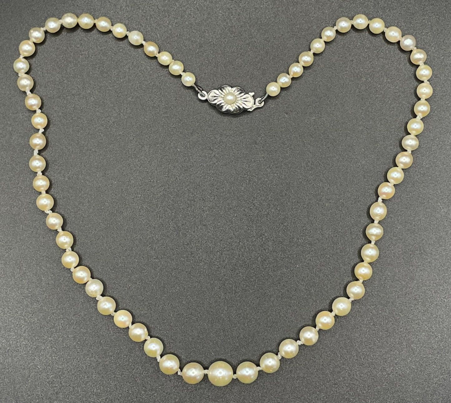 Antique real cultured pearl choker necklace, pearls graduated in size, hand-knotted, pretty sterling silver clasp, classic chic