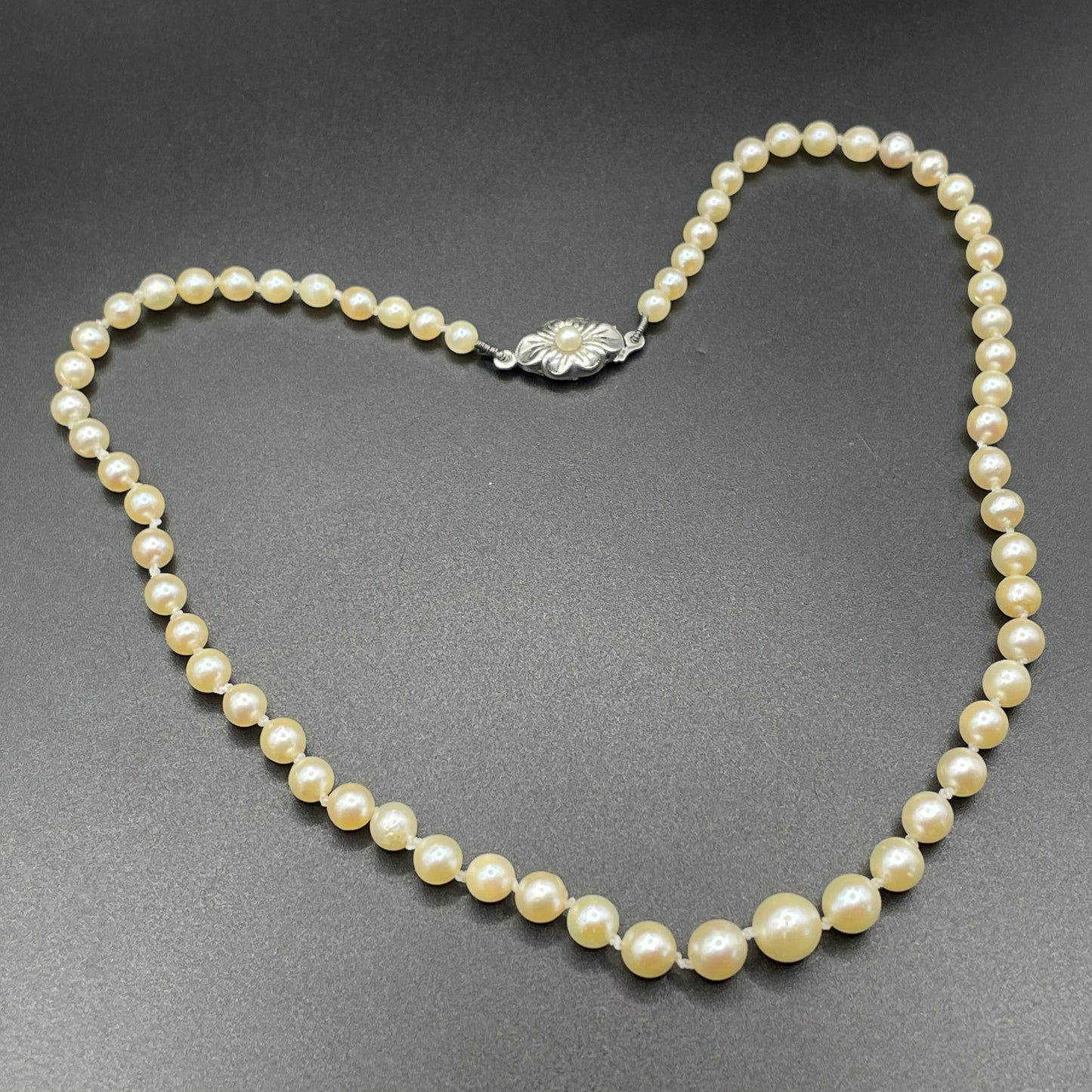 Antique real cultured pearl choker necklace, pearls graduated in size, hand-knotted, pretty sterling silver clasp, classic chic