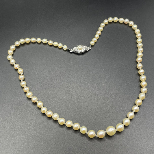 Antique real cultured pearl choker necklace, pearls graduated in size, hand-knotted, pretty sterling silver clasp, classic chic