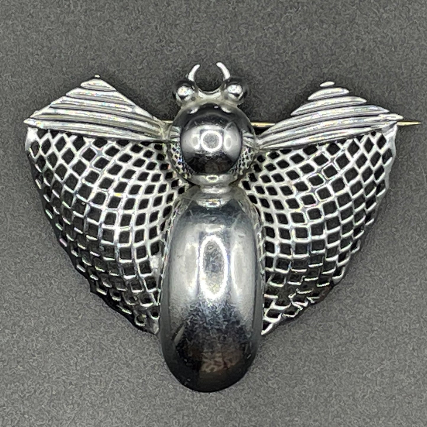 Vintage Art Deco machine age chrome stylised moth or butterfly bug brooch, 1930s