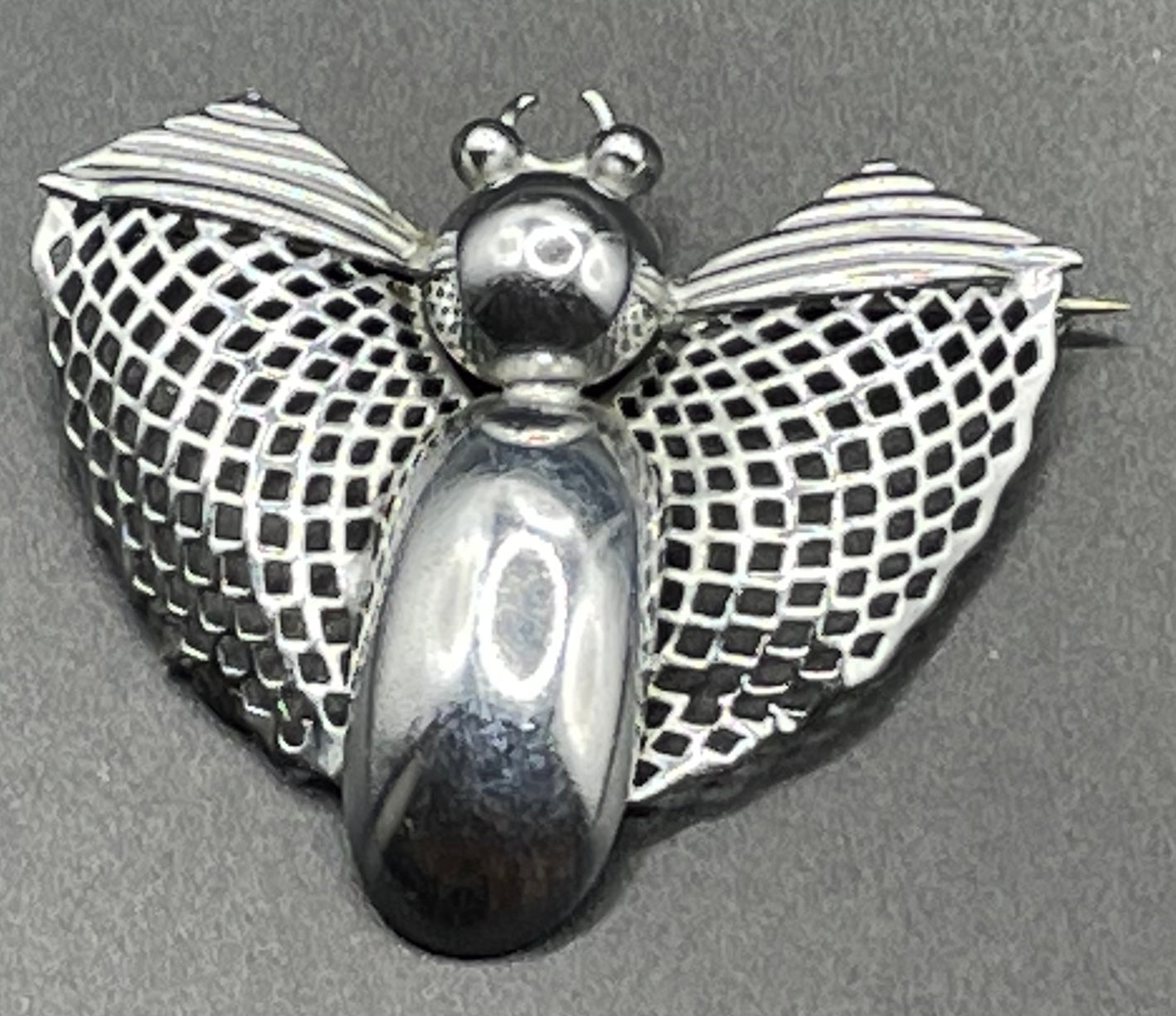 Vintage Art Deco machine age chrome stylised moth or butterfly bug brooch, 1930s