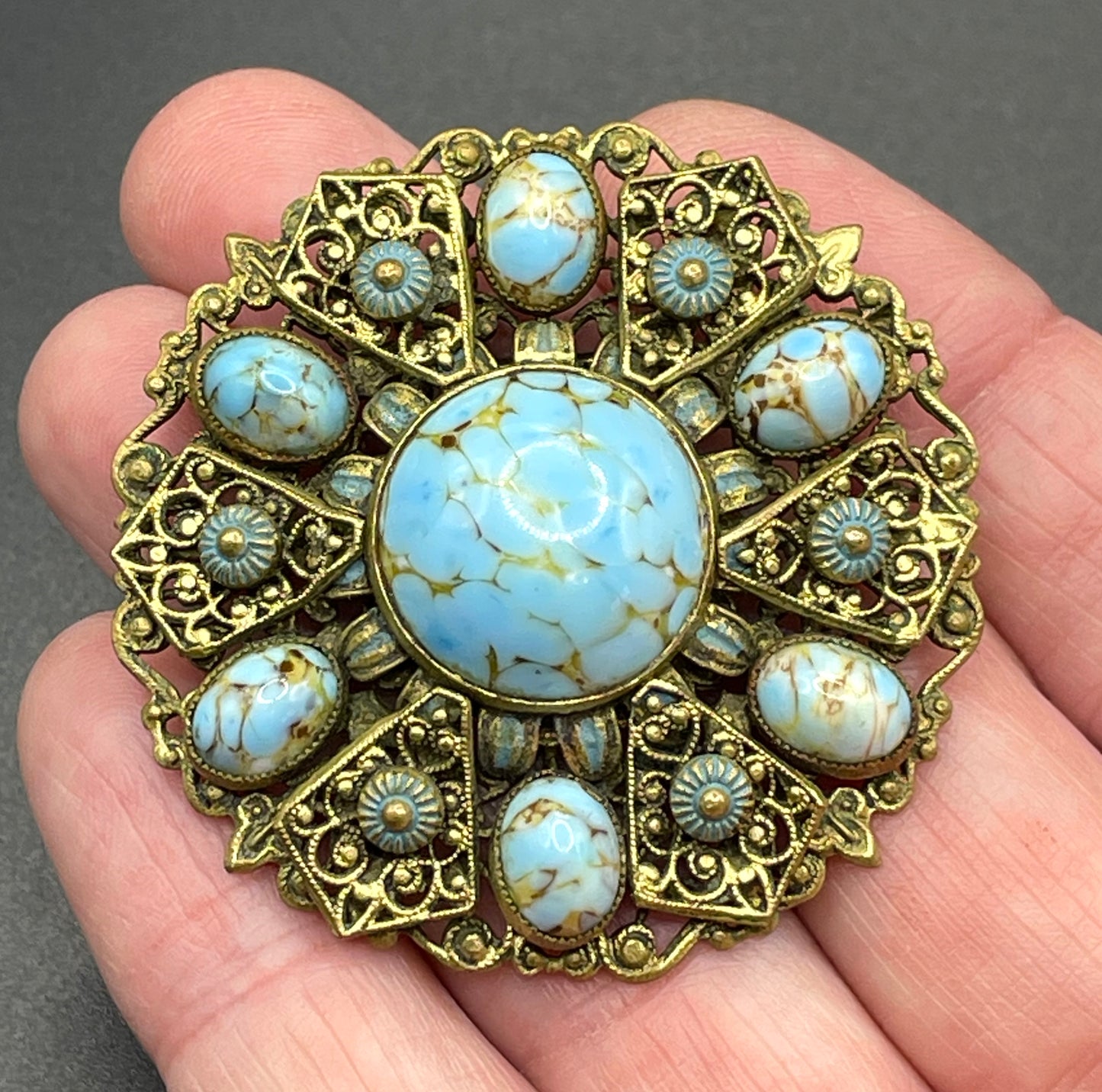 Vintage Neiger brothers Art Deco faux turquoise glass cabochon brooch in gold tone filigree