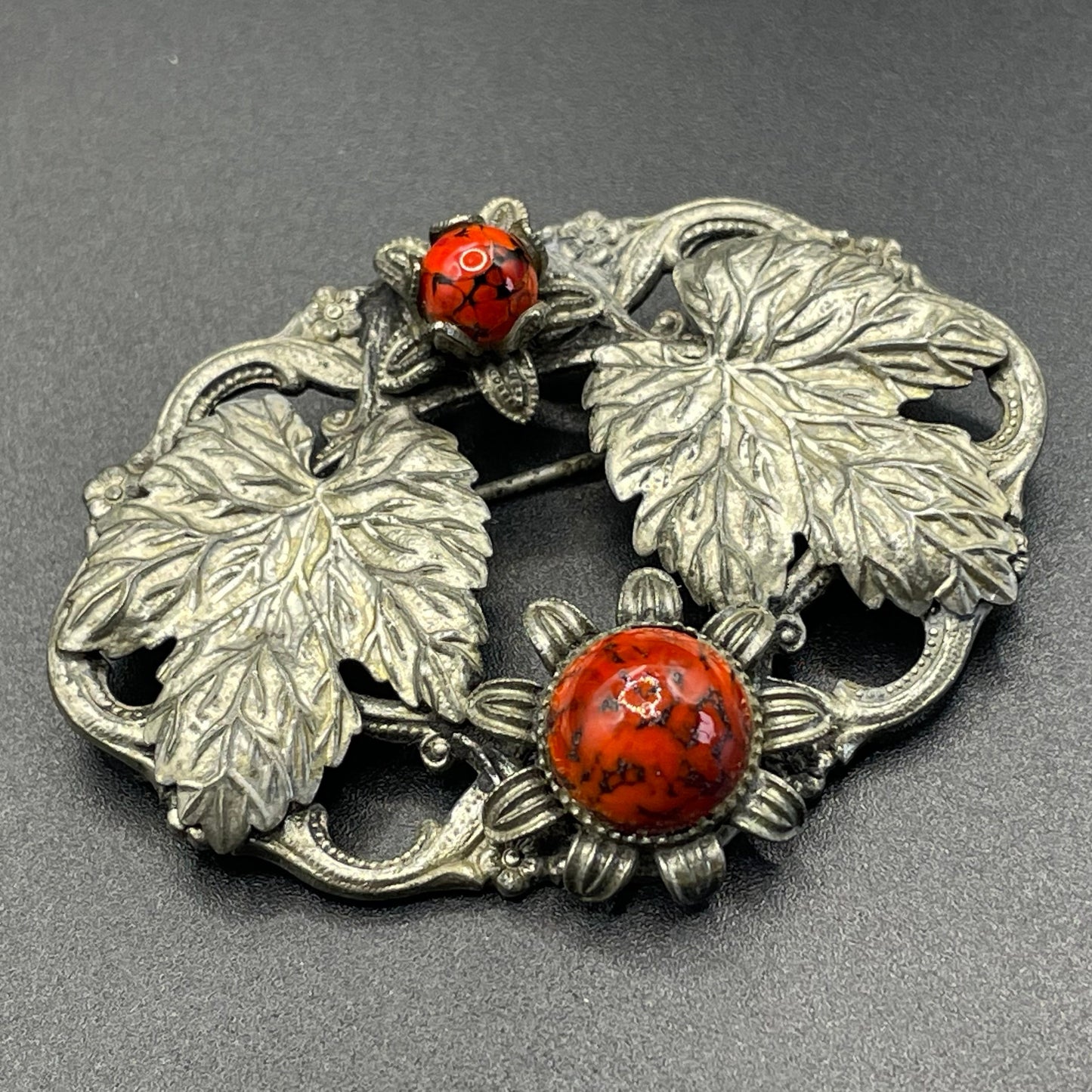 Vintage Art Deco Czech brooch, unusual dark red marbled art glass cabochons set in leaf design silver tone filigree