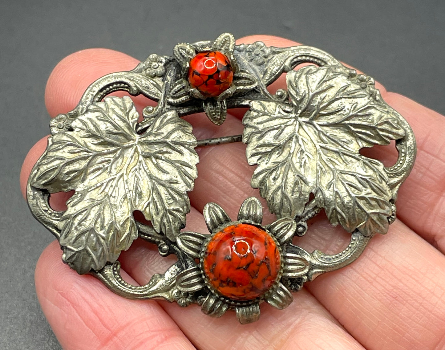 Vintage Art Deco Czech brooch, unusual dark red marbled art glass cabochons set in leaf design silver tone filigree