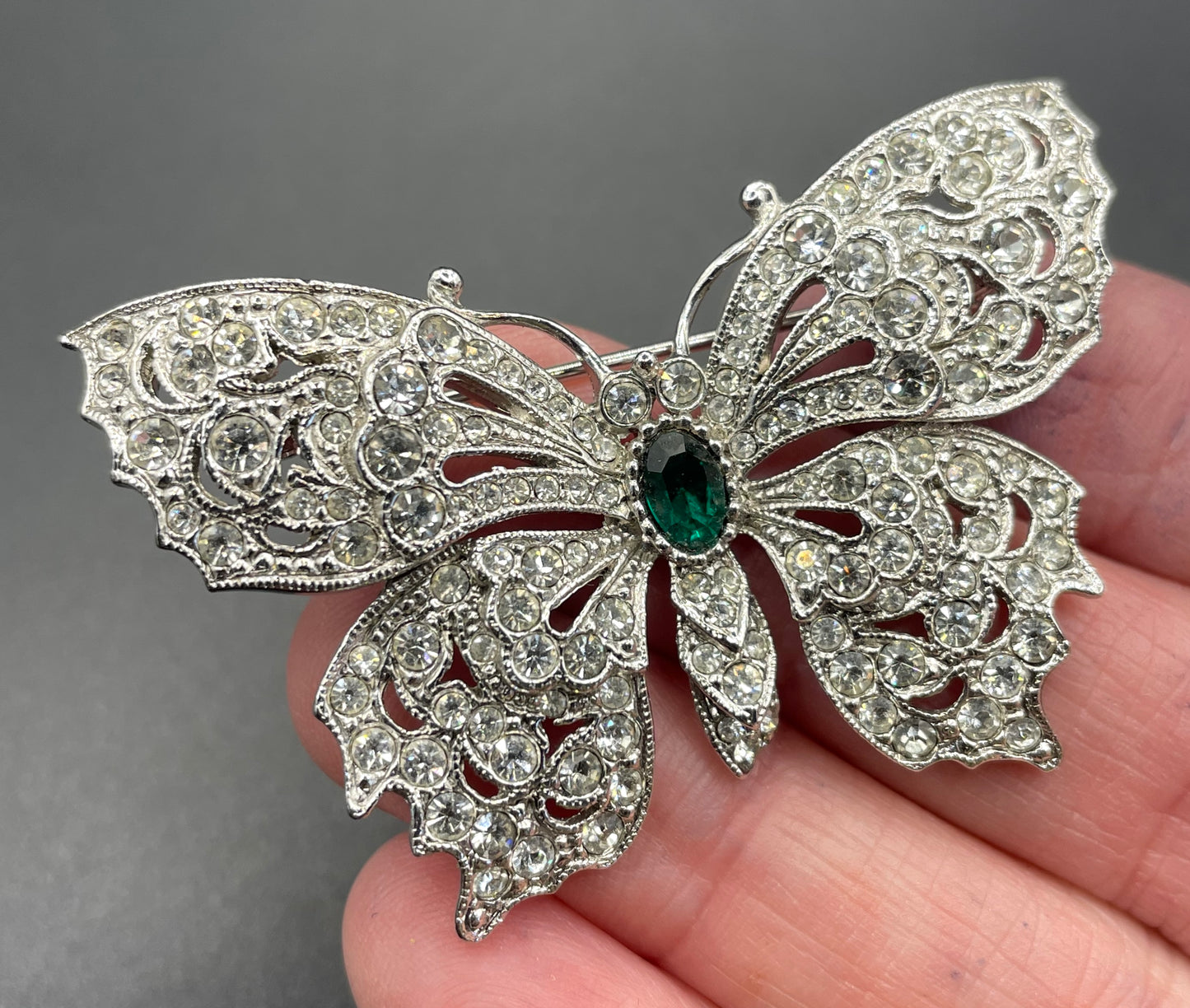 Vintage Attwood and Sawyer A&S signed butterfly brooch, clear pave rhinestone encrusted, emerald green rhinestone and silver tone