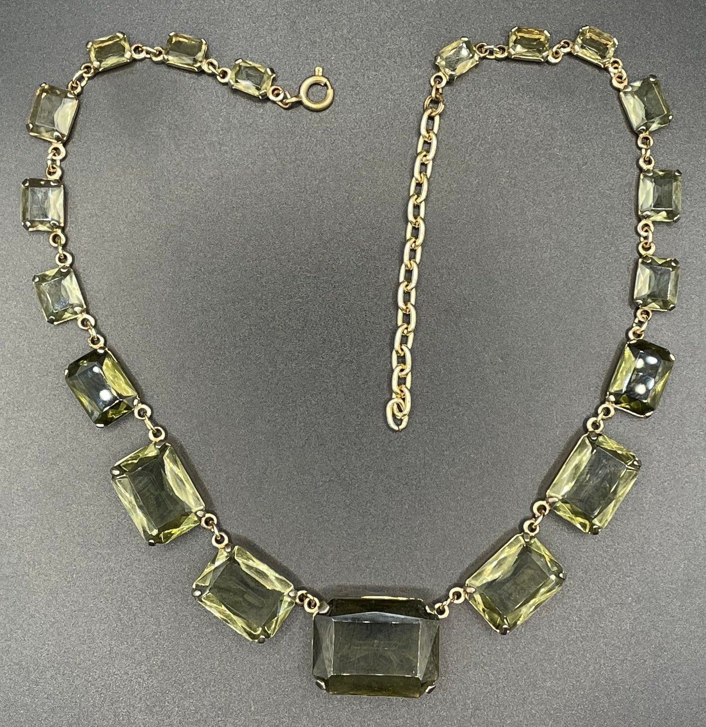 Vintage Art Deco peridot green khaki / grey crystal riviere necklace, baguette cut paste rhinestones, bezel set with open backs