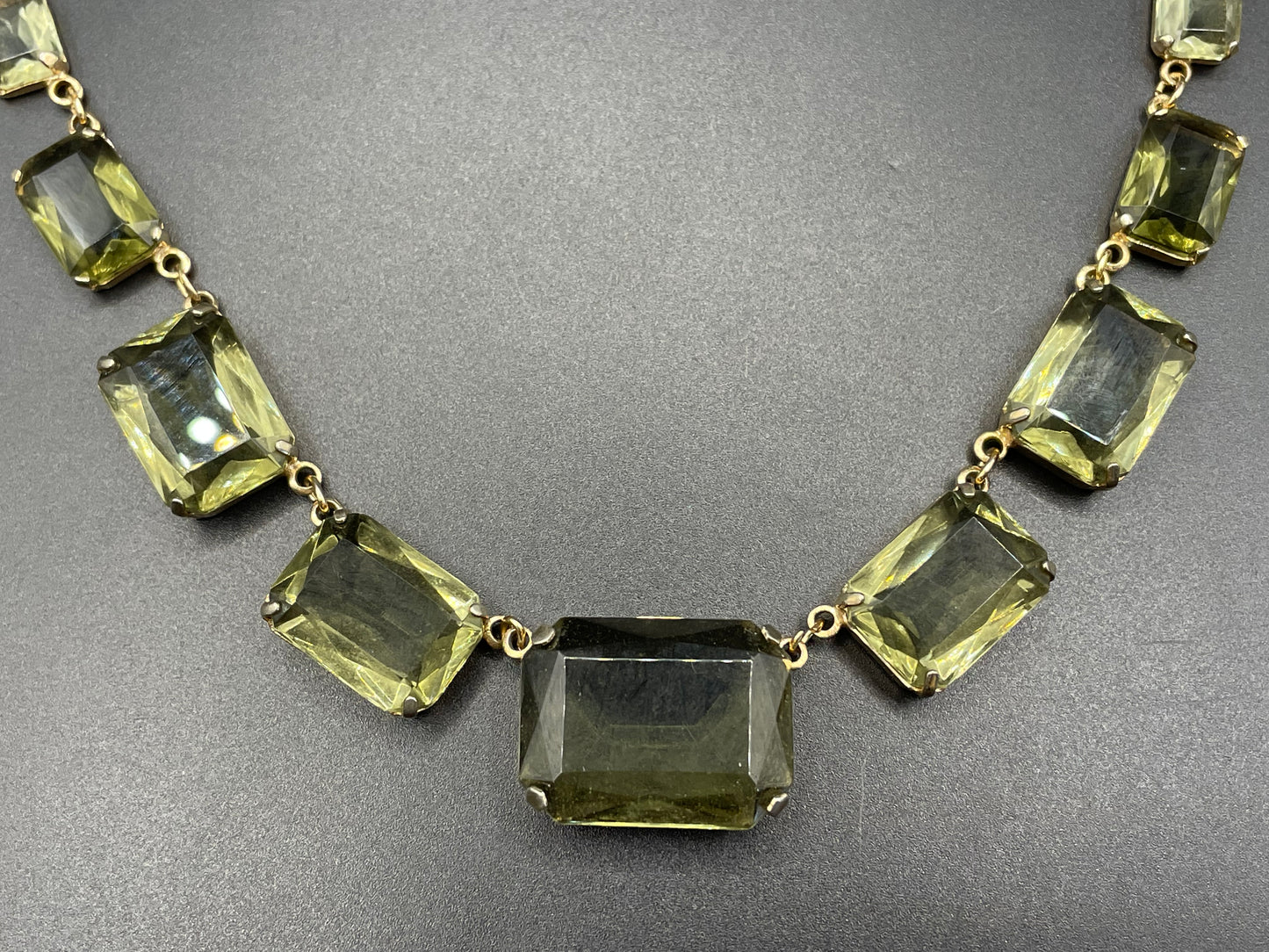 Vintage Art Deco peridot green khaki / grey crystal riviere necklace, baguette cut paste rhinestones, bezel set with open backs