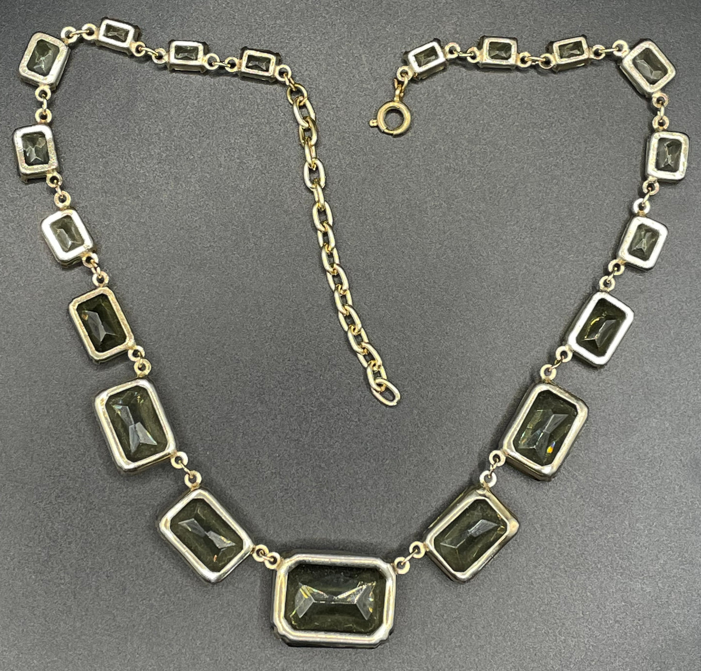 Vintage Art Deco peridot green khaki / grey crystal riviere necklace, baguette cut paste rhinestones, bezel set with open backs