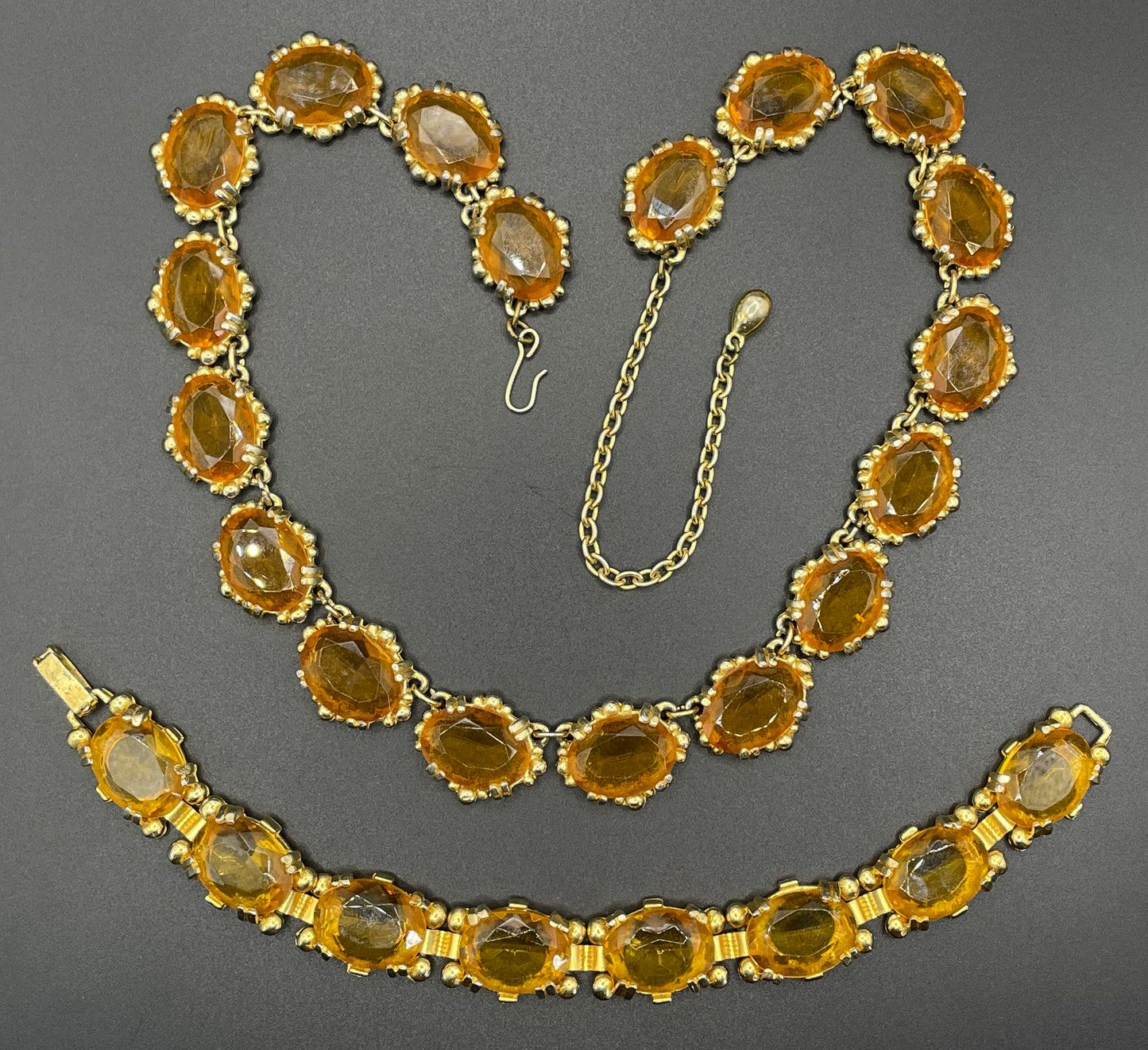 Vintage Sphinx orange citrine / topaz glass riviere necklace and bracelet set, heavy, bezel set, open-backed stones in ornate settings