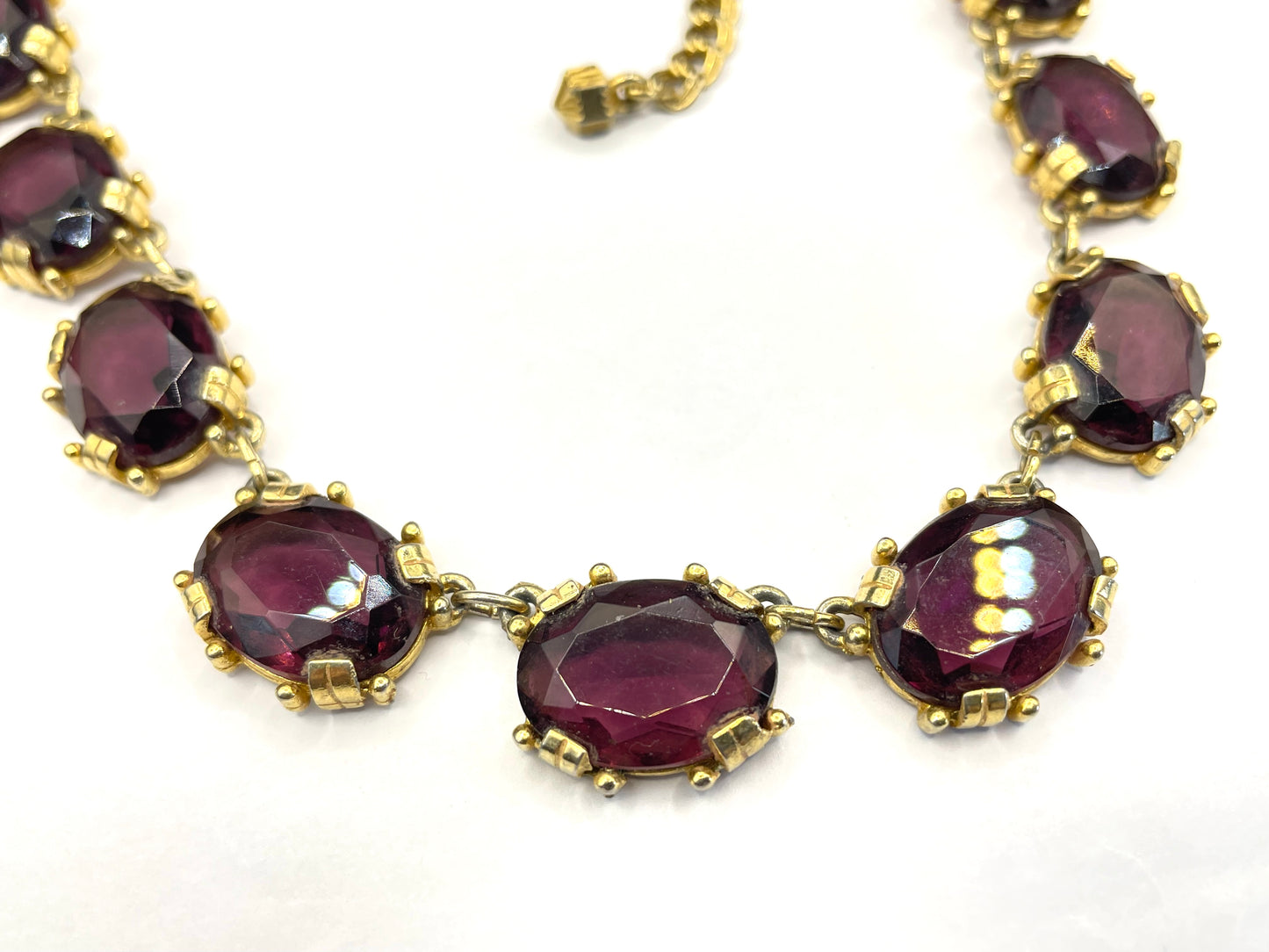 Vintage Sphinx amethyst purple glass riviere necklace, heavy, bezel set, open-backed stones in ornate gold tone settings