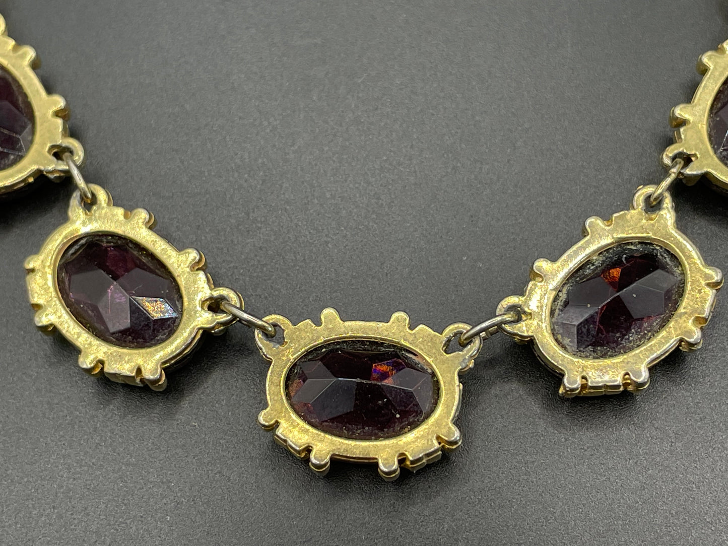 Vintage Sphinx amethyst purple glass riviere necklace, heavy, bezel set, open-backed stones in ornate gold tone settings