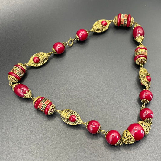 Vintage Neiger Brothers Art Deco heavy red glass bead necklace with beautiful gold tone features - by Max Neiger