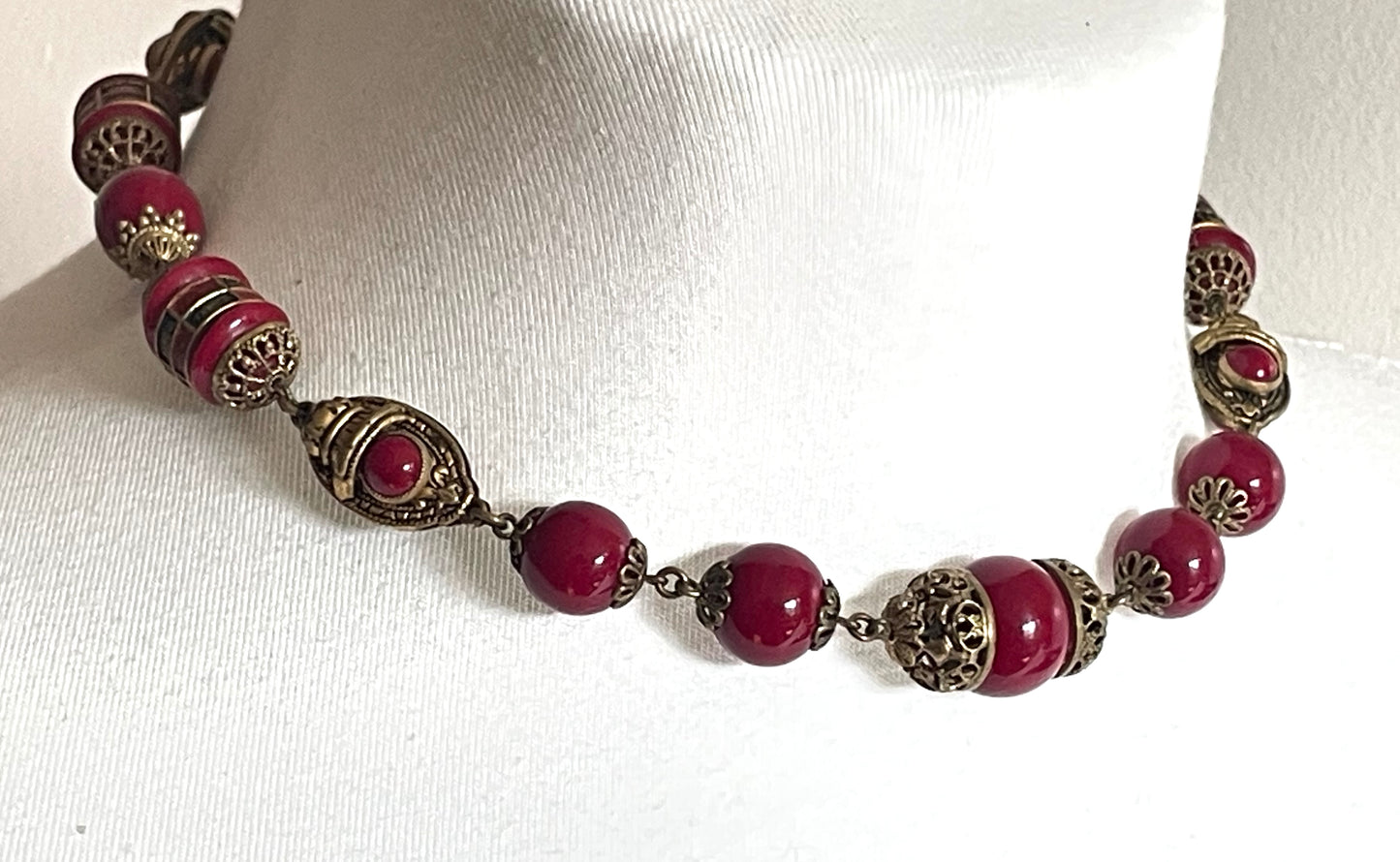 Vintage Neiger Brothers Art Deco heavy red glass bead necklace with beautiful gold tone features - by Max Neiger