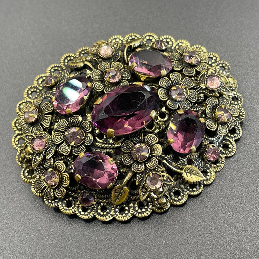 Large vintage Neiger style Art Deco amethyst purple glass rhinestone Czech brooch in antique gold tone filigree, floral design