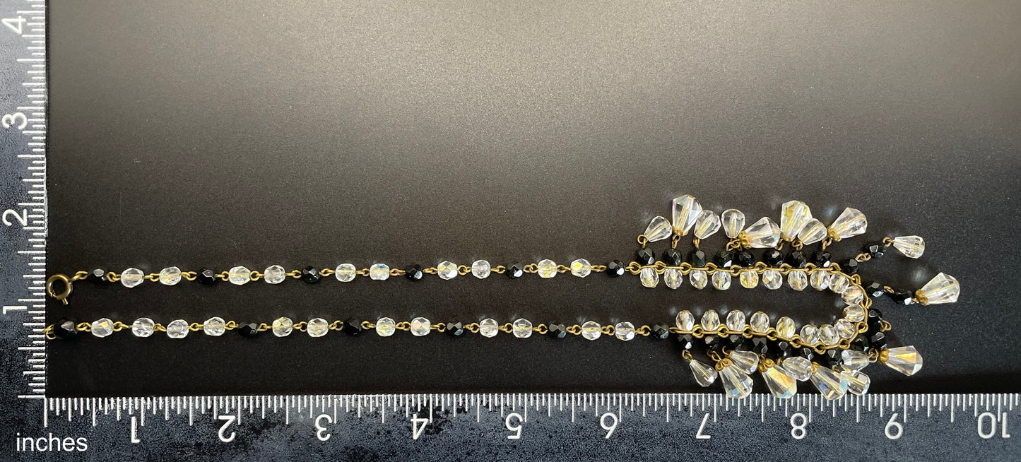 Vintage black and clear aurora borealis crystal faceted cut glass beaded fringe necklace with gold tone, delicate monochrome design