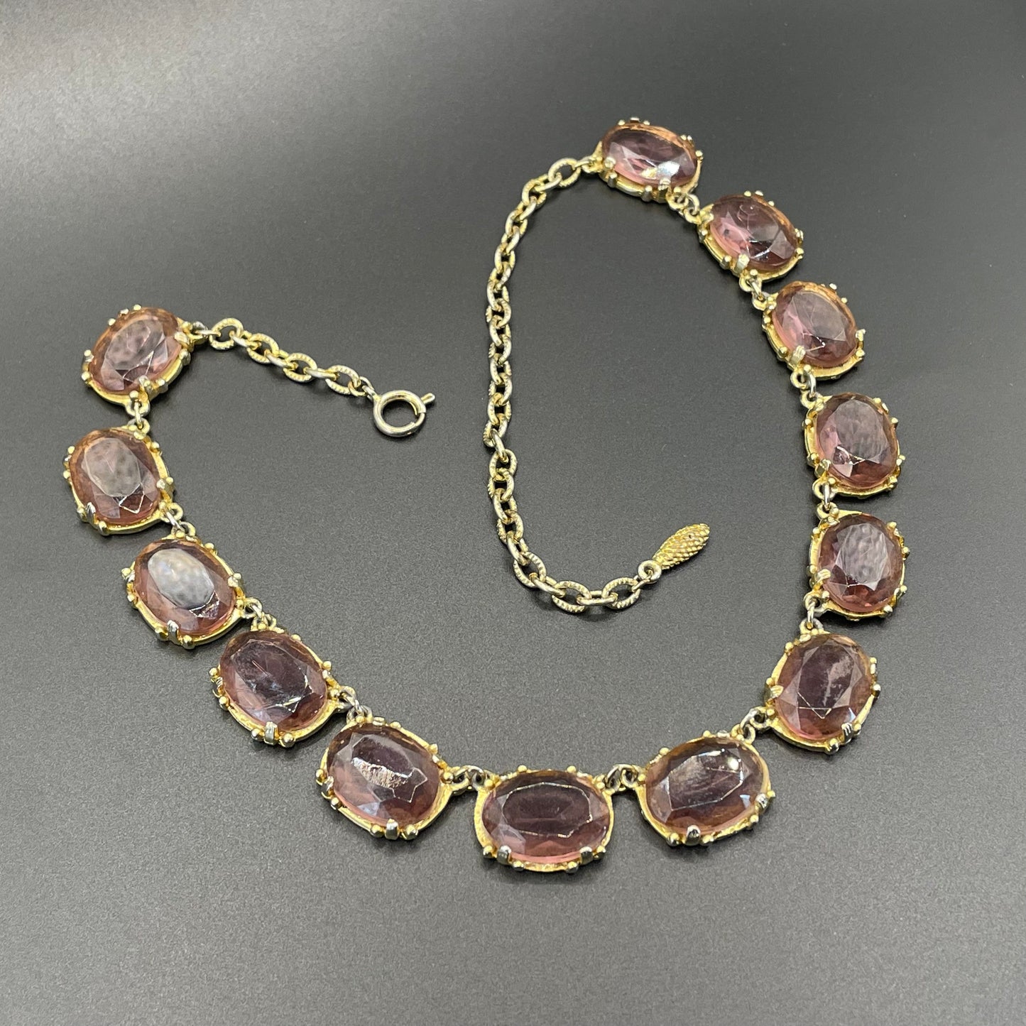 Vintage Sphinx amethyst purple / violet glass riviere necklace, heavy, bezel set, open-backed stones in ornate gold tone setting