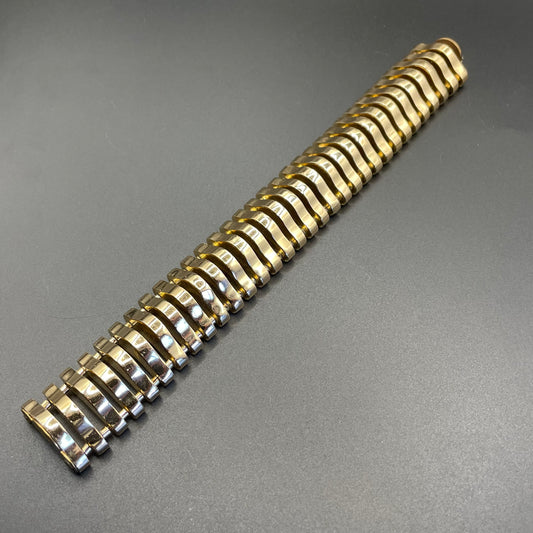 Vintage Art Deco machine age geometric architectural gold tone cuff bracelet, articulated tank track design