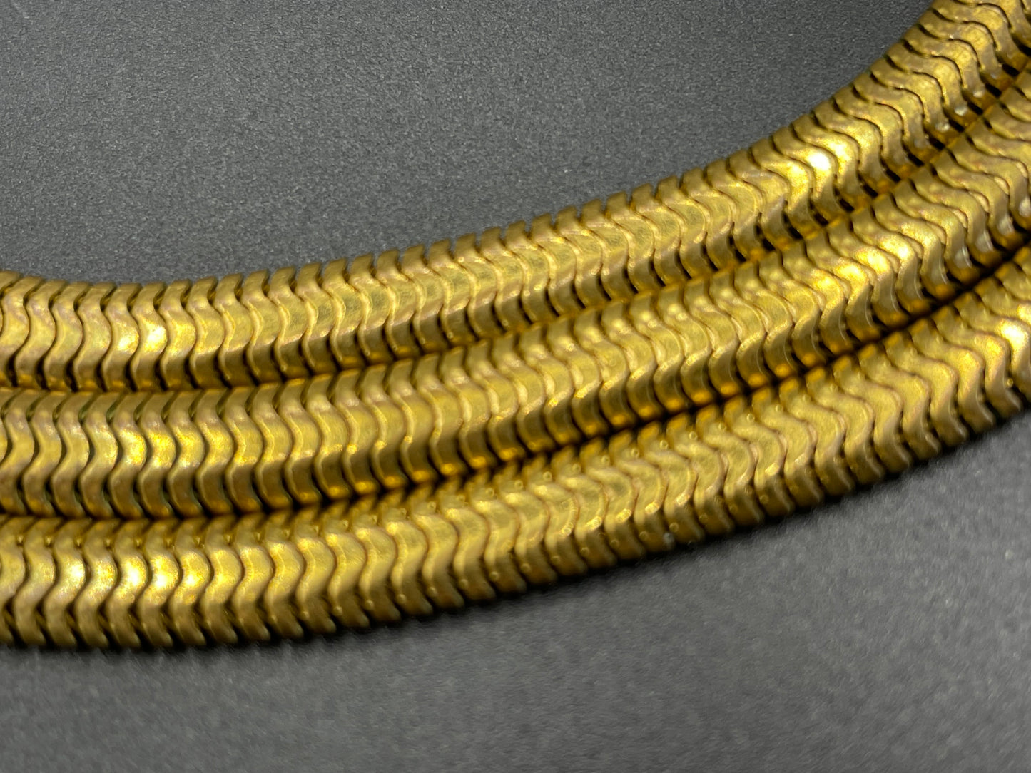 Vintage Art Deco machine age repousse bow clasp triple strand thick gold tone snake chain necklace