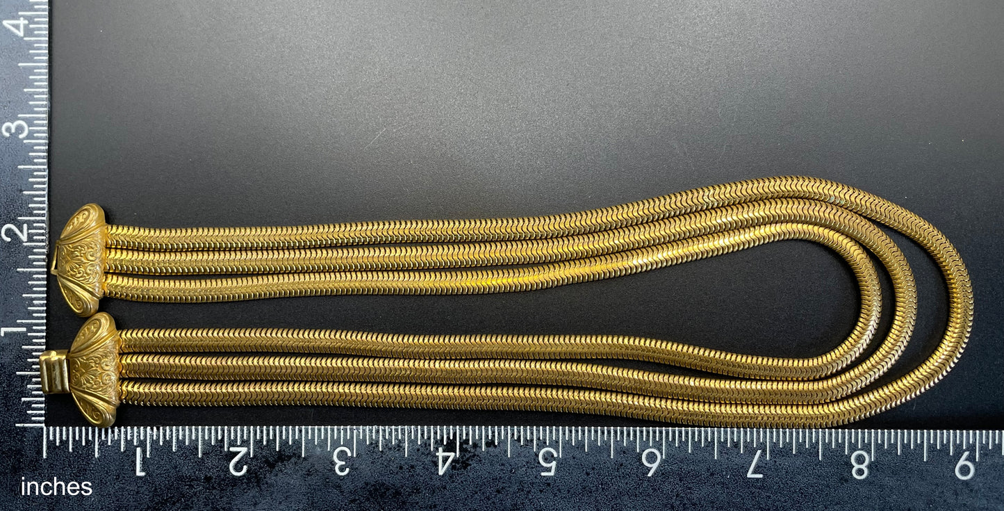 Vintage Art Deco machine age repousse bow clasp triple strand thick gold tone snake chain necklace