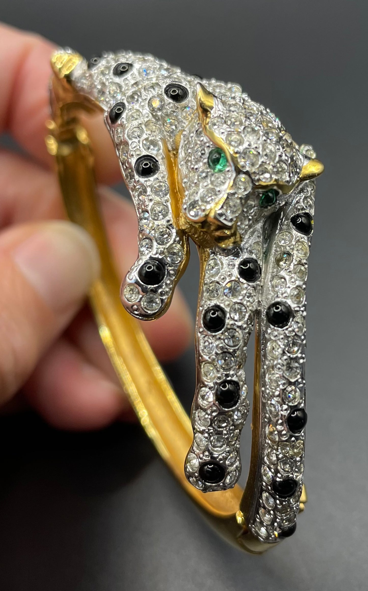 Vintage leopard / panther bangle, gold plated, green and black glass cabochons, clear rhinestones, interesting stamp signature