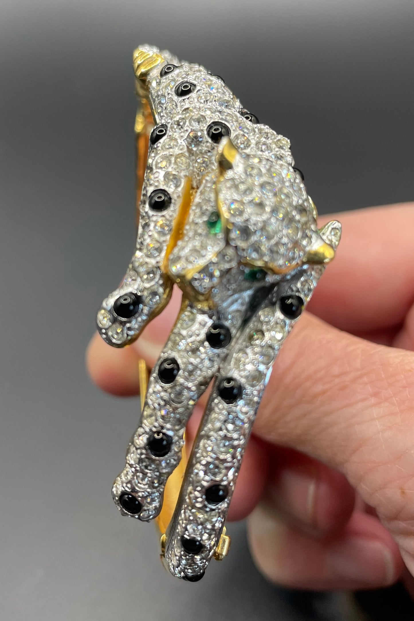Vintage leopard / panther bangle, gold plated, green and black glass cabochons, clear rhinestones, interesting stamp signature