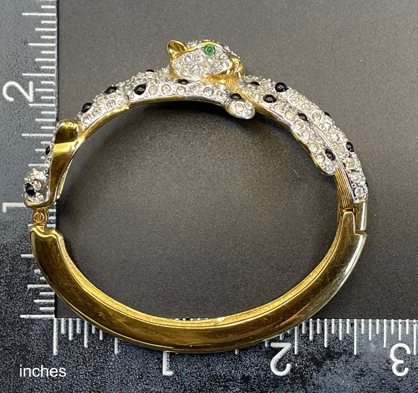 Vintage leopard / panther bangle, gold plated, green and black glass cabochons, clear rhinestones, interesting stamp signature