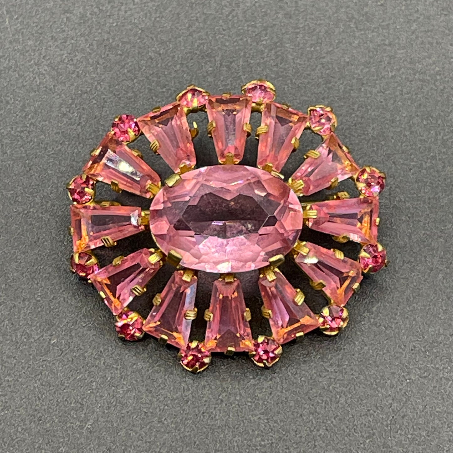 Vintage Art Deco Czech ruby pink glass, unusual shaped rhinestone, open-backed, gold tone brooch pin, petite size